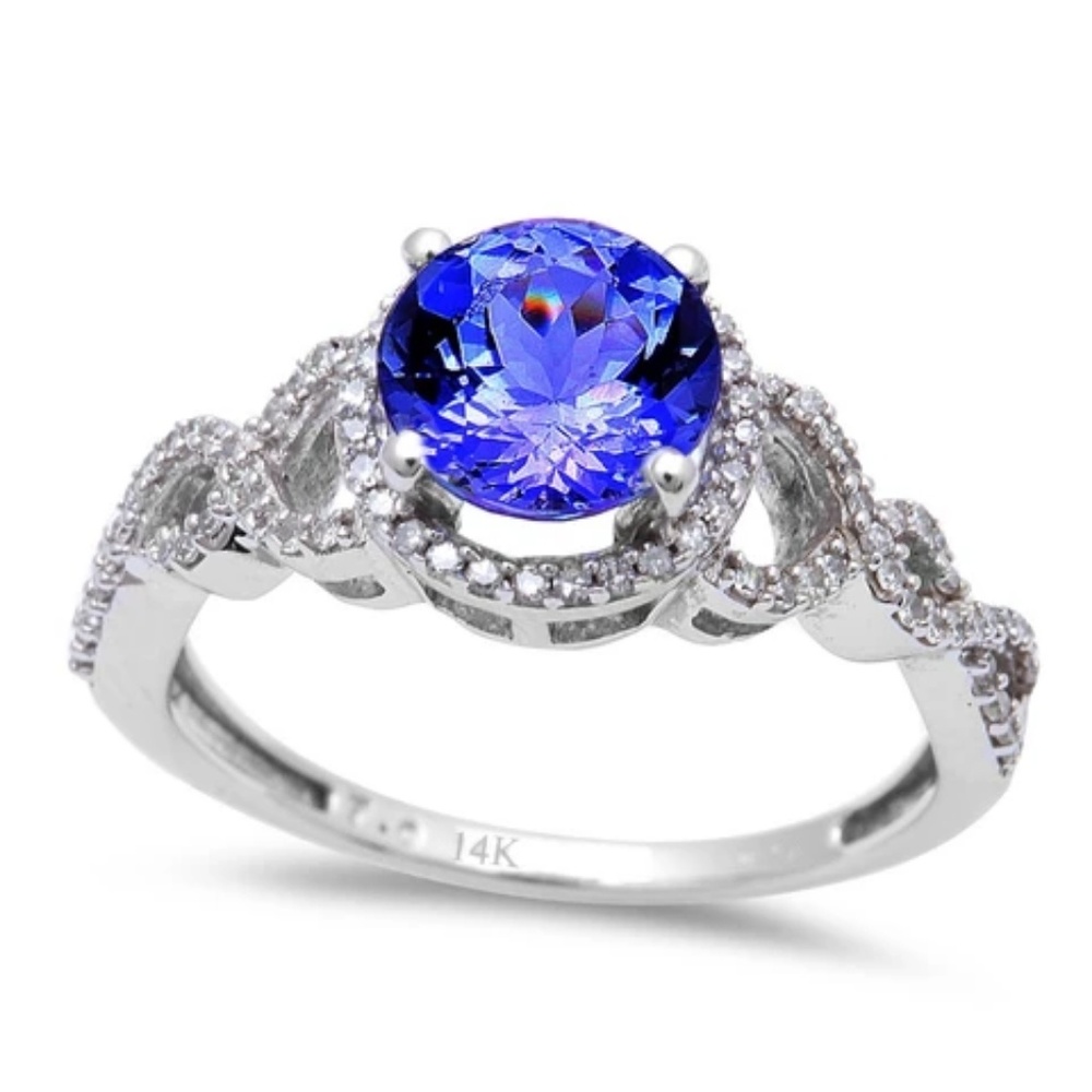 white gold tanzanite and diamond engagement ring